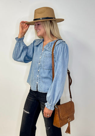 tan fedora hat with a western flair