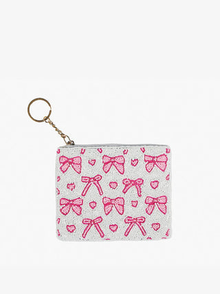 bows and hearts on a beaded coin purse that is also keychain