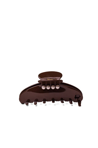 A glossy dark brown hair claw clip with pearl-like decorative accents on the front, shown against a plain white background.