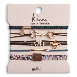 A set of five K'lani Gallop hair ties and bracelets displayed on their original cream-colored backing card. The set includes a teal braided hair tie, a brown leather bracelet with a gold horse bit, a dark brown leather bracelet with white and gold beads and a gold horse charm, a teal and gold curved bracelet, and a patterned elastic hair tie with a brown K'lani brand tab.