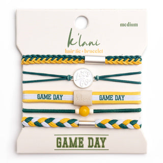 Set of green, yellow, and white hair tie-bracelets on a 'klani' branded card.