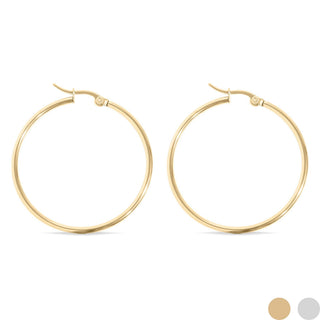 Gold hoop earrings on a white background