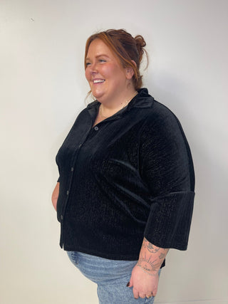 black velvet shimmery top that is sized for regular and curvy women