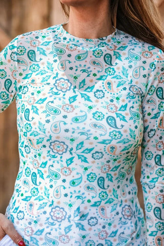 long sleeve teal paisley top with a western look to it